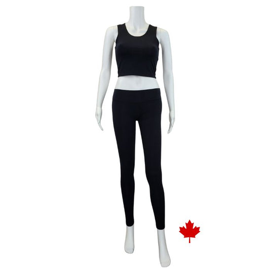 white mannequin wearing black eve yoga full length leggings and black stephanie crop tank top front view on white background