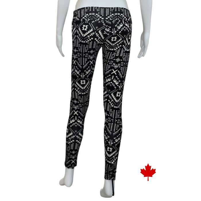 Eve full length yoga leggings black and white geographic print back view of leggings on mannequin
