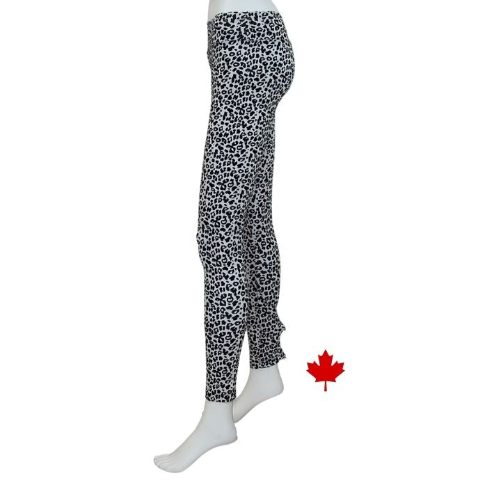 Eve full length yoga leggings black and white leopard print side view of leggings on mannequin