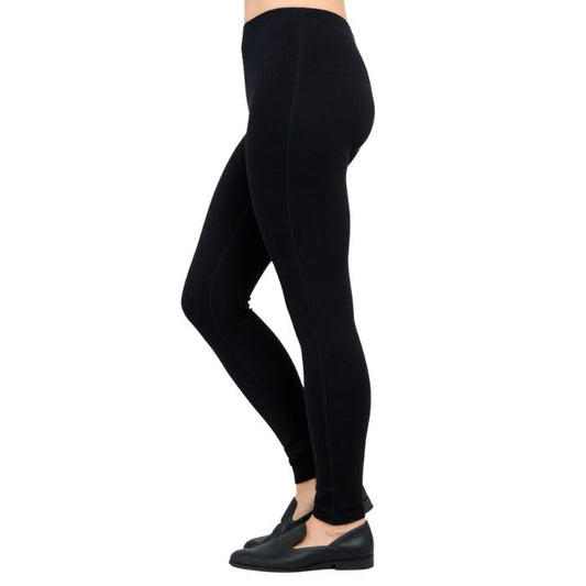 bottom of female model wearing bobbi black fleece leggings side view on white background