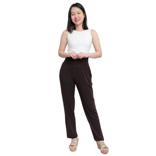 female model wearing coffee brown clair pants and white reanna tank top front view on white background