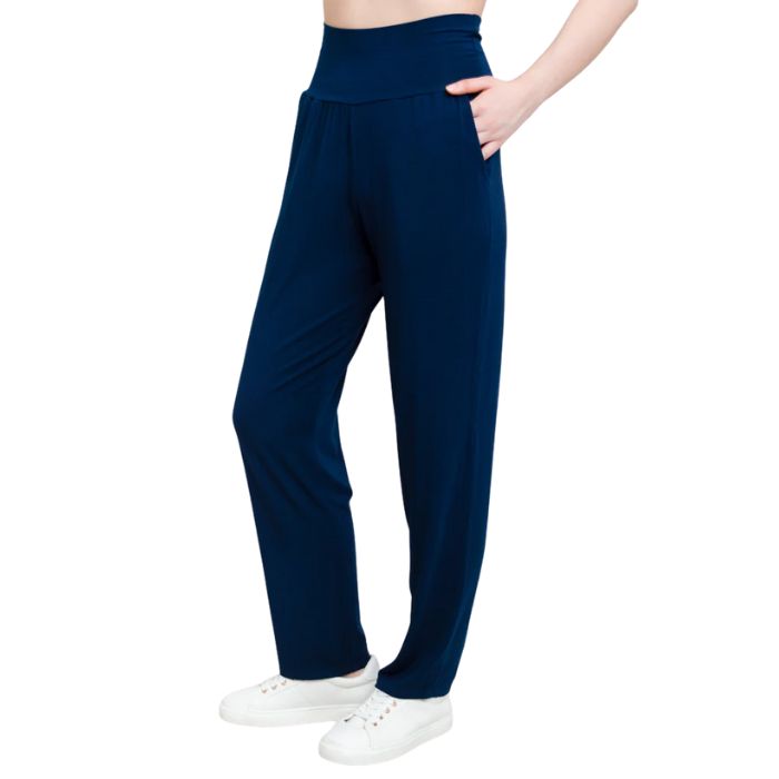bottom of female model wearing indigo blue clair pants side view on white background