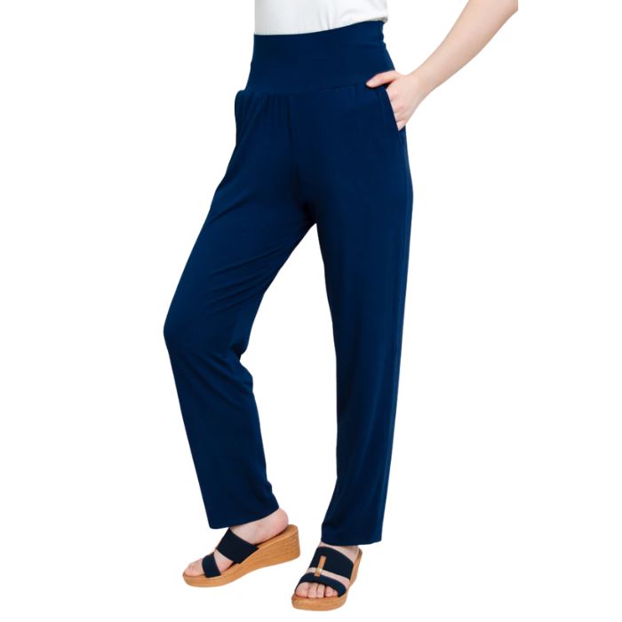 bottom of female model wearing indigo blue clair pants side view on white background