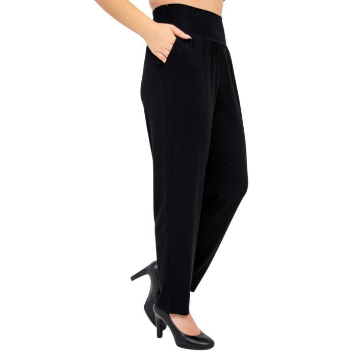 bottom of female model wearing black clair petite pants side view on white background