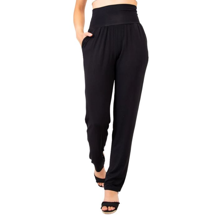bottm of female model wearing black clair pants tall front view on white backround
