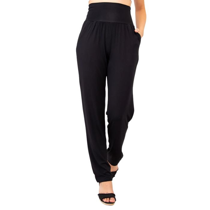 bottm of female model wearing black clair pants tall front view on white backround
