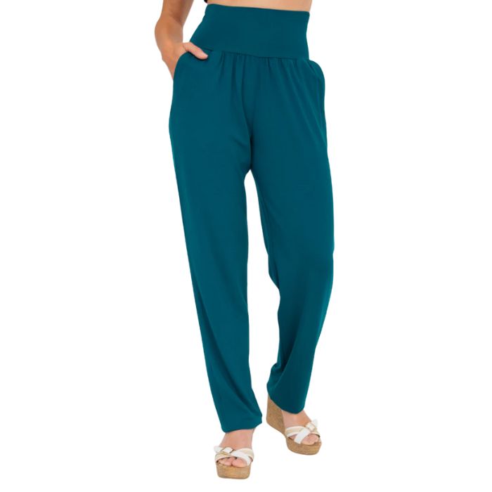 bottom of female model wearing teal green clair pants front view on white background
