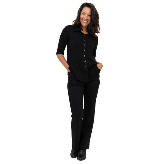 female model wearing black daya pants and black lorrine blouse front view on white background