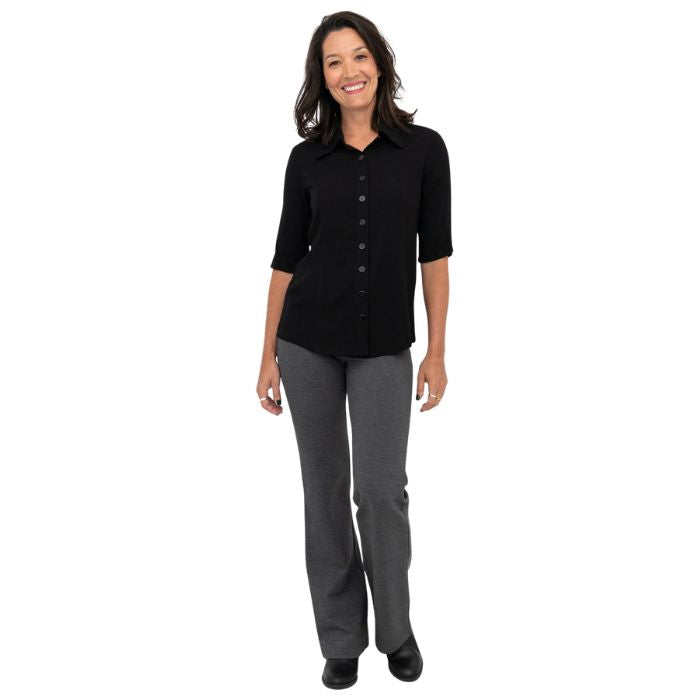 female model wearing granite grey daya pants and black lorrine blouse front view on white background