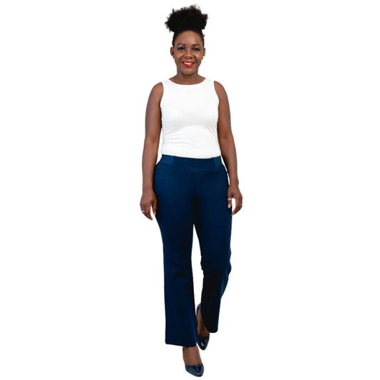 female model wearing indigo blue daya pants and white reanna tank top front view on white background