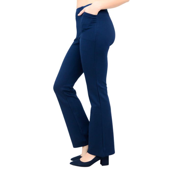 bottom of female model wearing indigo blue daya pants side view on white background