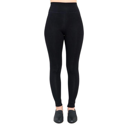 bottom of female model wearing dixie black fleece leggings front view on white background