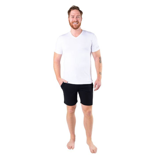 top of male model wearing white huron v-neck t-shirt and black aspen shorts front view on white background