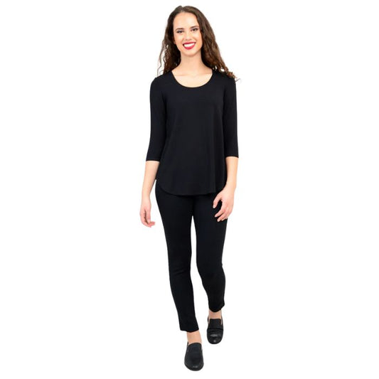 female model wearing jazz black three quarter sleeve top and nadia black pants front view on white background