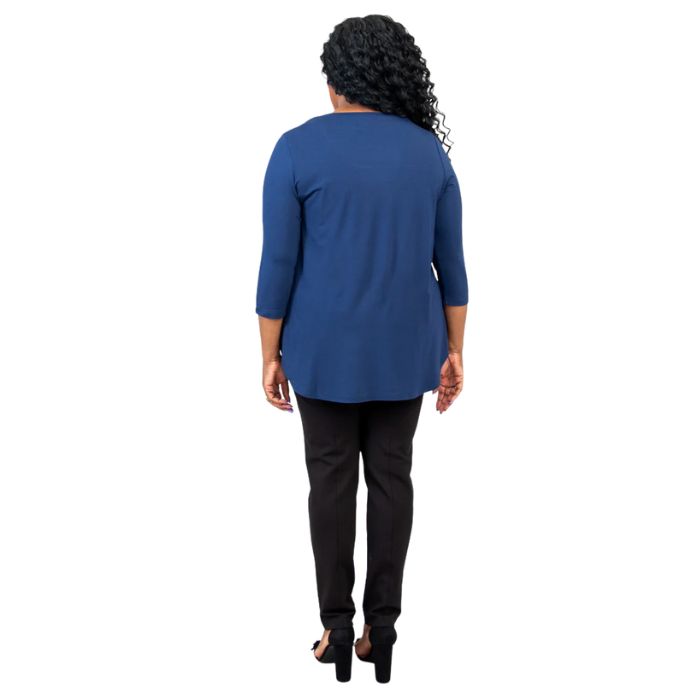 female model wearing jazz indigo blue three quarter sleeve top and nadia black pants front view on white background