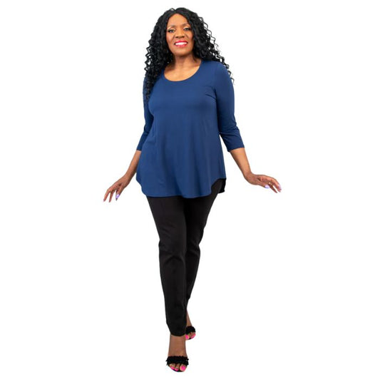 female model wearing jazz indigo blue three quarter sleeve top and nadia black pants front view on white background