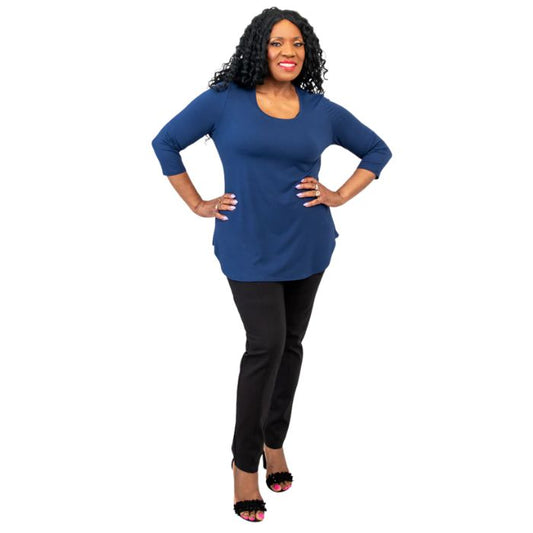 female model wearing jazz indigo blue three quarter sleeve top and nadia black pants front view on white background