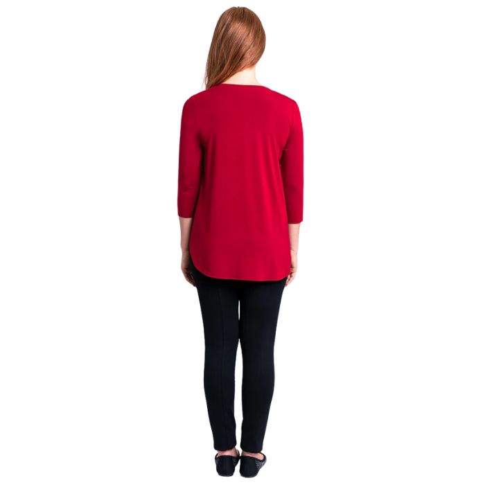 female model wearing jazz lipstick red three quarter sleeve top and nadia black pants back view on white background