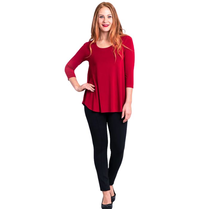 female model wearing jazz lipstick red three quarter sleeve top and nadia black pants front view on white background