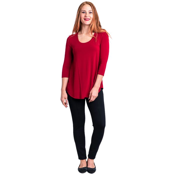 female model wearing jazz lipstick red three quarter sleeve top and nadia black pants front view on white background