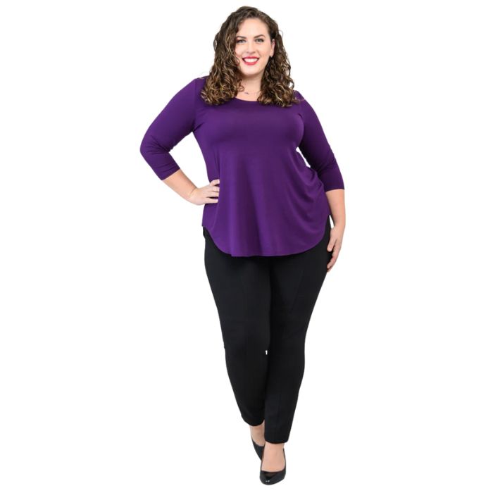female model wearing jazz royal purple three quarter sleeve top and nadia black pants side view on white background
