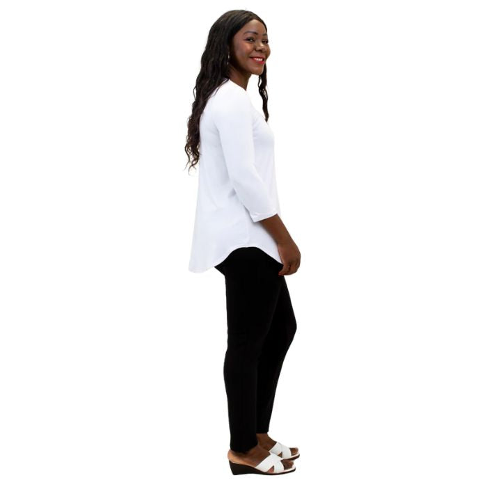 female model wearing jazz white three quarter sleeve top and nadia black pants side view on white background