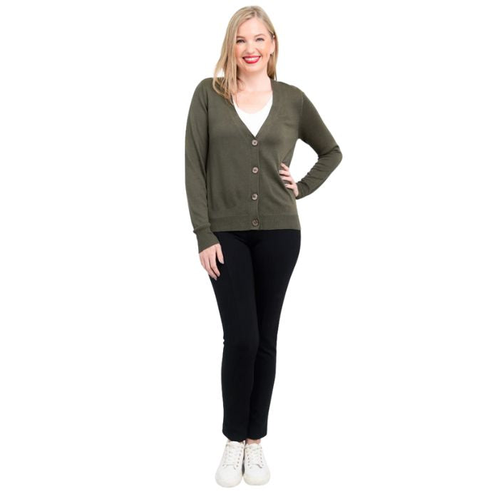 female model wearing jessica khaki green button up cardigan sweater, reanna white tank top and nadine black pants front view on white background
