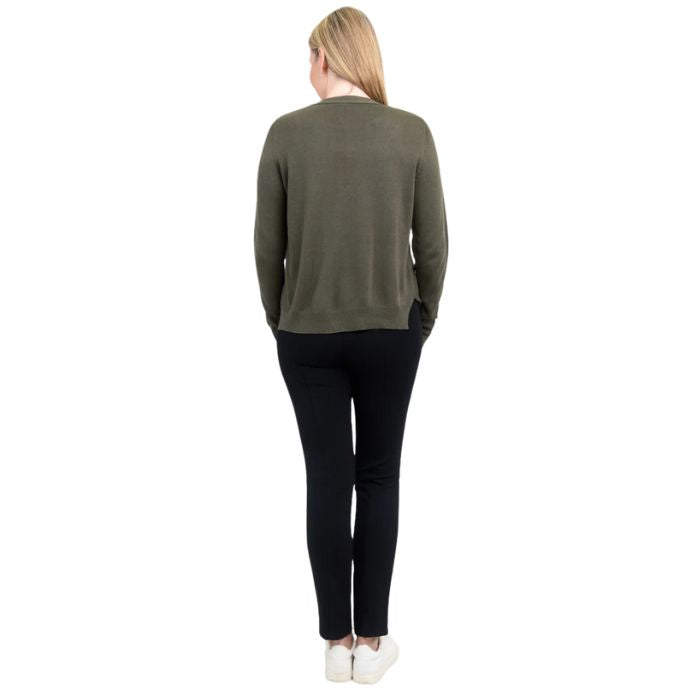 female model wearing jessica khaki green button up cardigan sweater, reanna white tank top and nadine black pants back view on white background