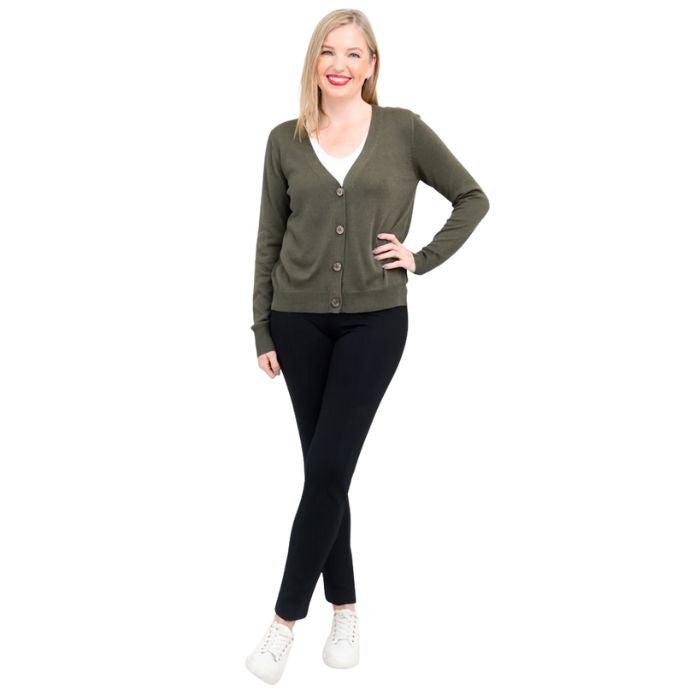 female model wearing jessica khaki green button up cardigan sweater, reanna white tank top and nadine black pants front view on white background