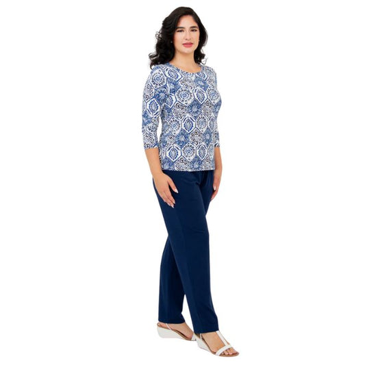 female model wearing margorie zesty print three quarter sleeve top and clair indigo blue pants front view on white background