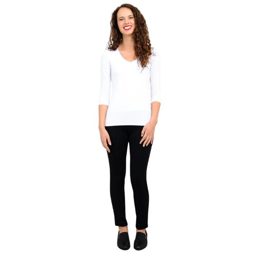 female model wearing mia white three quarter sleeve top and nadia black pants front view on white background