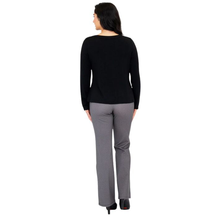 female model wearing mona black long sleeve top and daya pants back view on white background