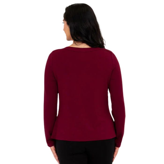 top of female model wearing mona burgundy red long sleeve top back view on white background