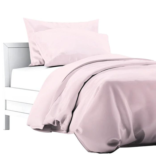 a bed made with pale rose pink terrera duvet cover and two pillowcases on white background
