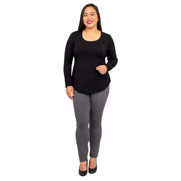 female model wearing tessa long sleeve top black and nadia granite grey pants front view on white background