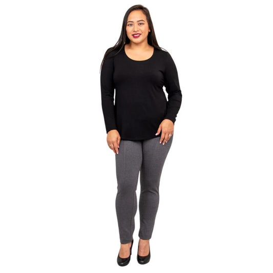 female model wearing tessa long sleeve top black and nadia granite grey pants front view on white background