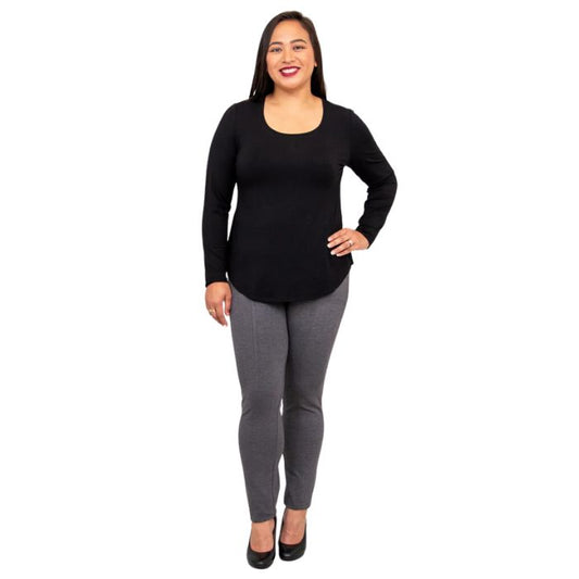 female model wearing tessa long sleeve top black and nadia granite grey pants front view on white background