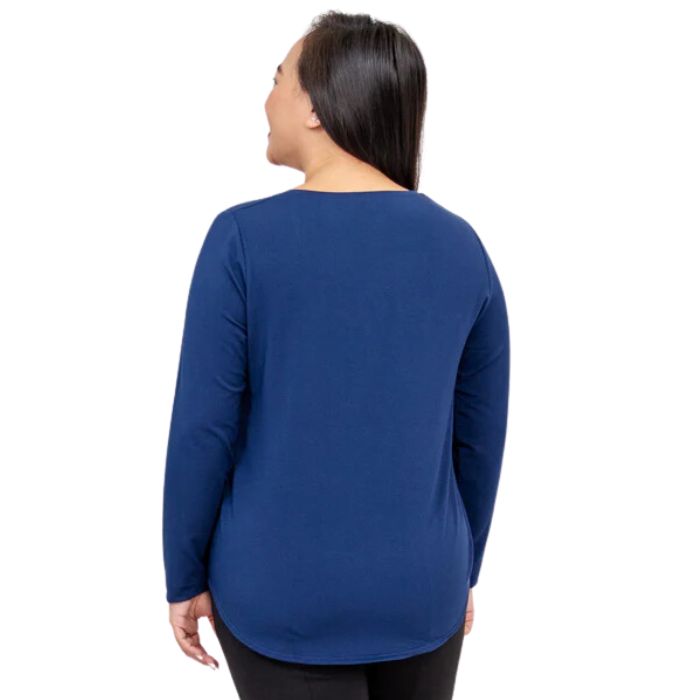 top of female model wearing tessa long sleeve top indigo blue back view on white background