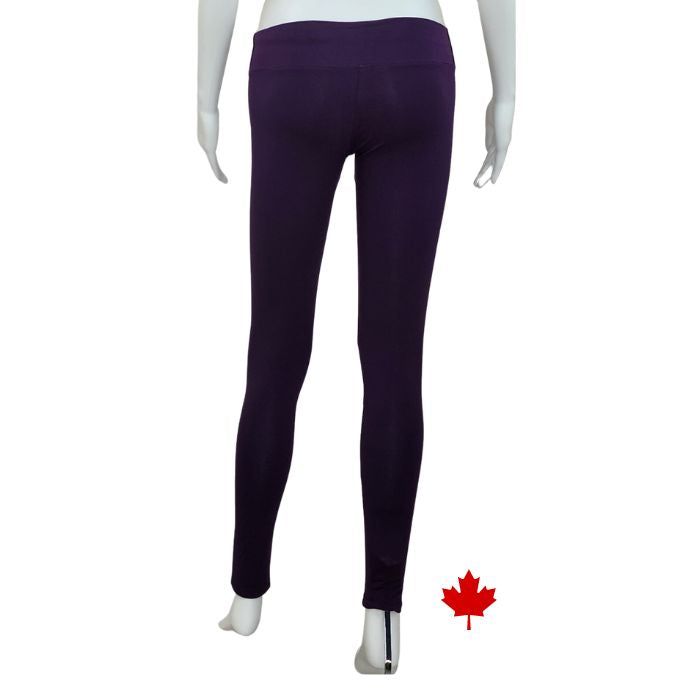 Eve full length yoga leggings plum purple back view of leggings on mannequin