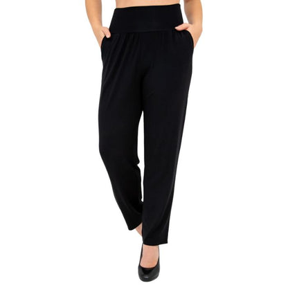 bottom of female model wearing black clair petite pants front view on white background