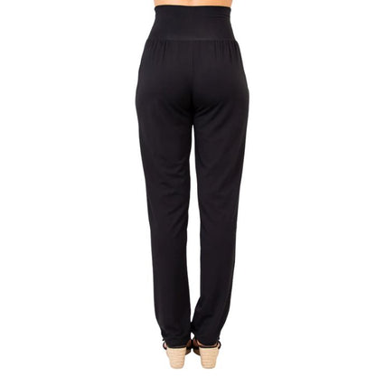 bottm of female model wearing black clair pants tall back view on white backround