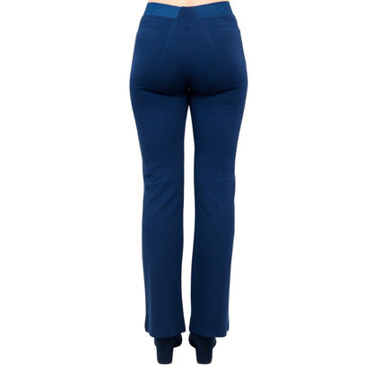 bottom of female model wearing indigo blue daya pants back view on white background