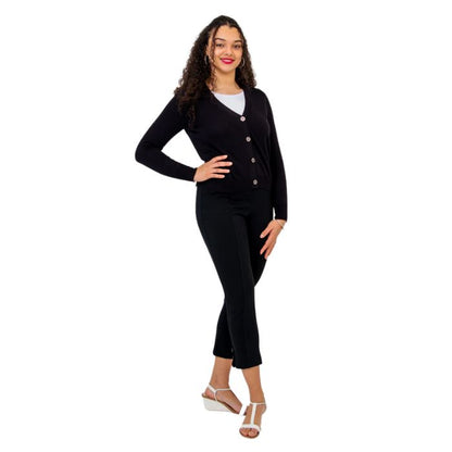 female model wearing black jessica button up cardigan sweater white reanna tank top and black nadine cropped pants front view on white background