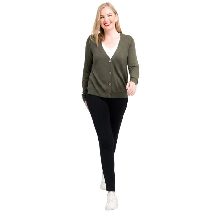 female model wearing khaki green jessica button up cardigan sweater, white reanna tank top and black nadia pants front view on white background