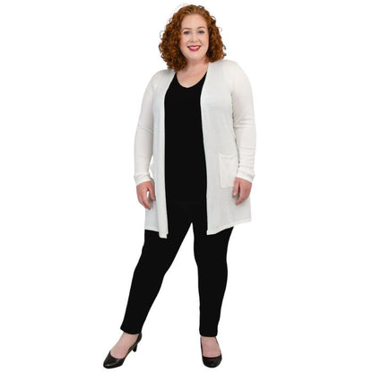 female model wearing white justine draped cardigan sweater over black reanna tank top and black nadia pants  front view on white background