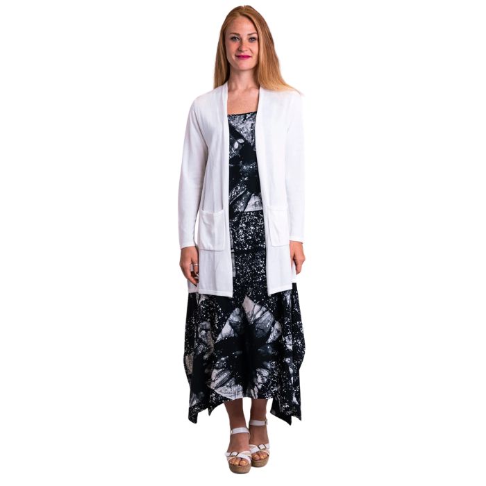 female model wearing white justine draped cardigan sweater over long martha dress front view on white background