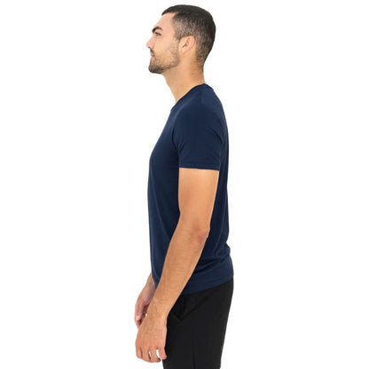 male model wearing ink blue lawrence crew neck t-shirt side view on white background
