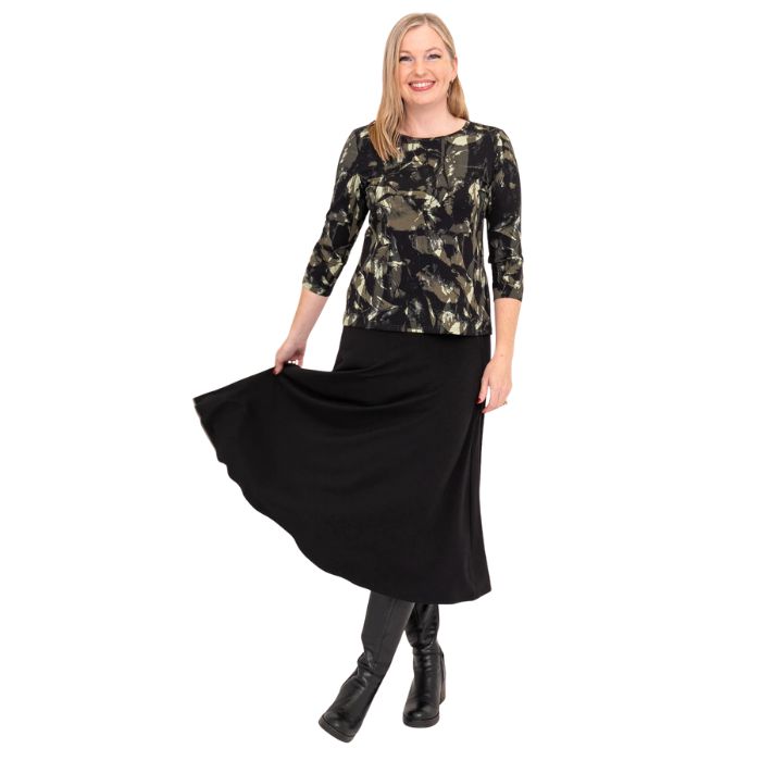 female model wearing margorie khaki oak three quarter sleeve top print and gillian black long skirt front view on white background