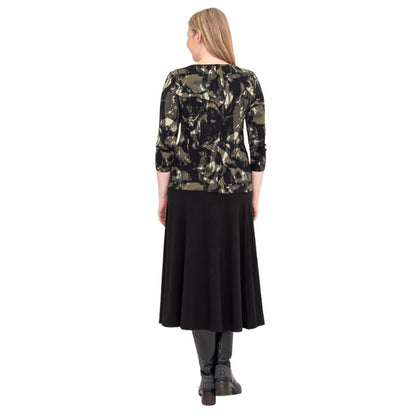 female model wearing margorie khaki oak three quarter sleeve top print and gillian black long skirt back view on white background
