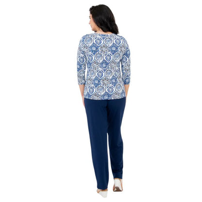 female model wearing margorie zesty print three quarter sleeve top and clair  indigo blue pants back view on white background